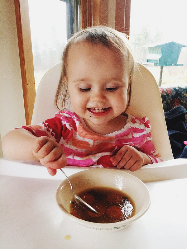 Enjoying her soup...