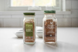 Regular and Ceylon cinnamon in jars side by side.