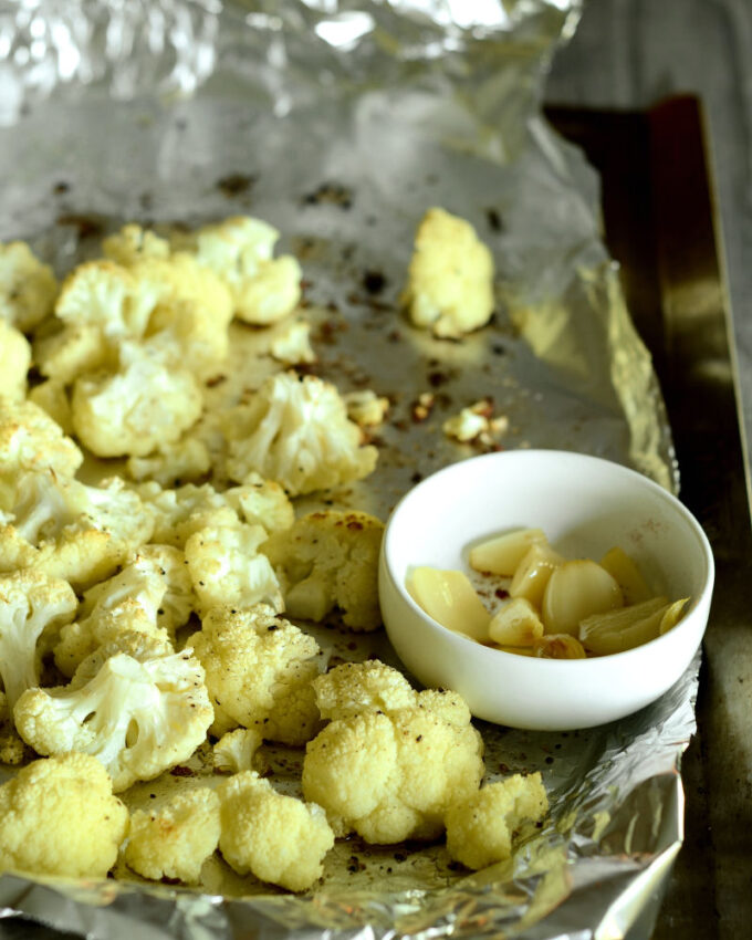 A pan of roasted garlic and cauliflower. 