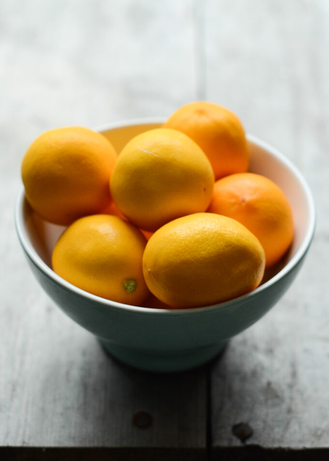 A bowl of meyer lemons