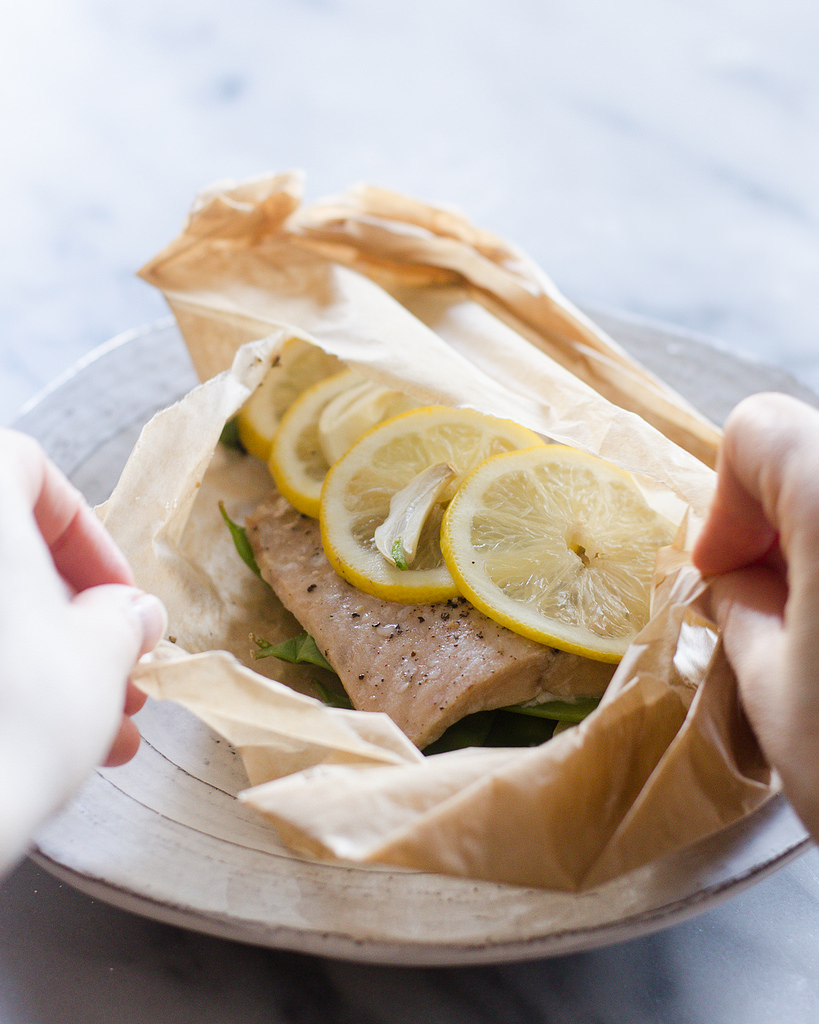 Opening up a Salmon en Papillote.