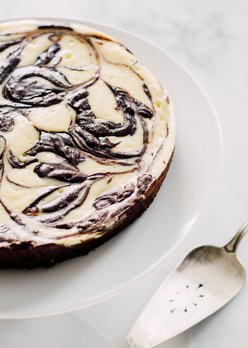 This Chocolate Marble Cheesecake Recipe is gluten free and flourless!