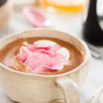 Homemade Honey-Sweetened Dark Chocolate Cocoa with Pink Whipped Cream