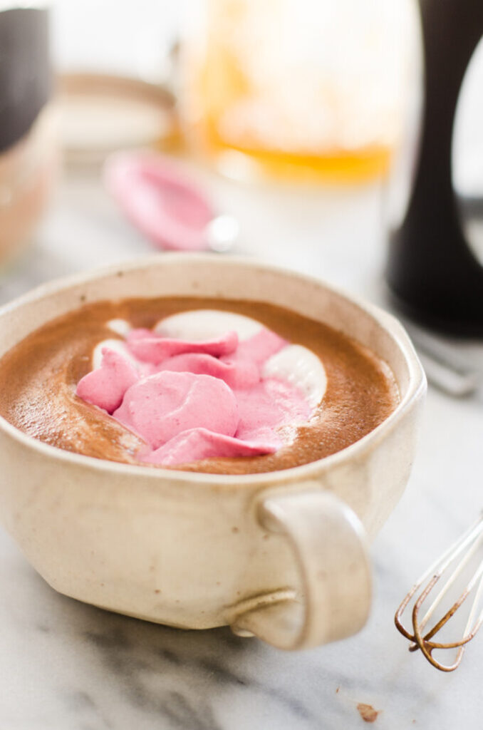 Homemade Honey-Sweetened Dark Chocolate Cocoa with Pink Whipped Cream