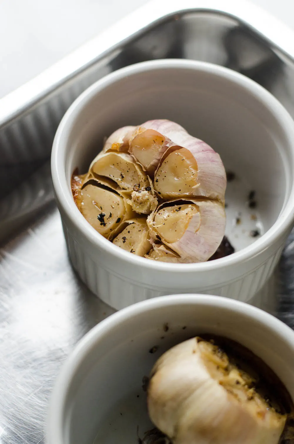 How to Roast Garlic Without Aluminum Foil - Learn how to easily roast garlic without wrapping it in aluminum foil!