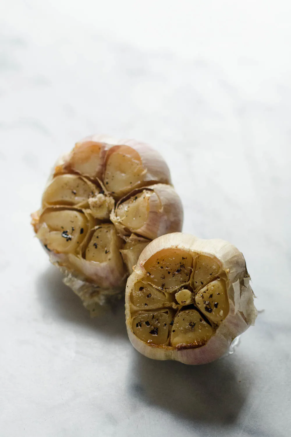 How to Roast Garlic Without Aluminum Foil - Learn how to easily roast garlic without wrapping it in aluminum foil!