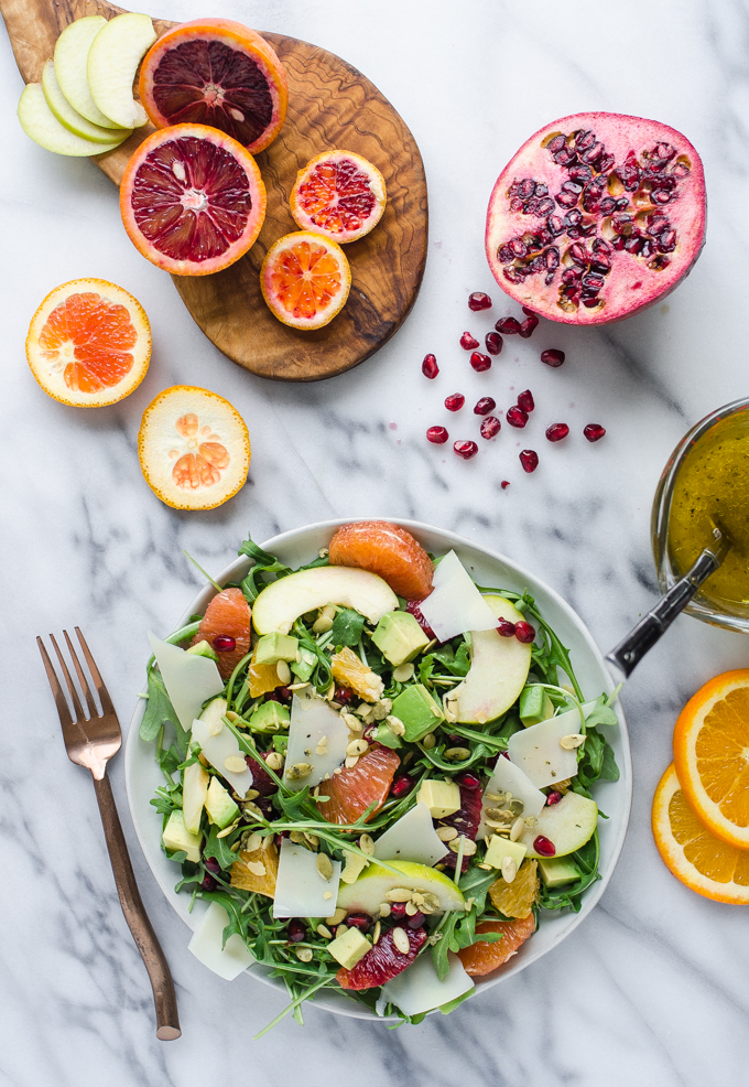 Winter Salad with Arugula, Avocado, Pomegranate, Blood Orange, and Apple