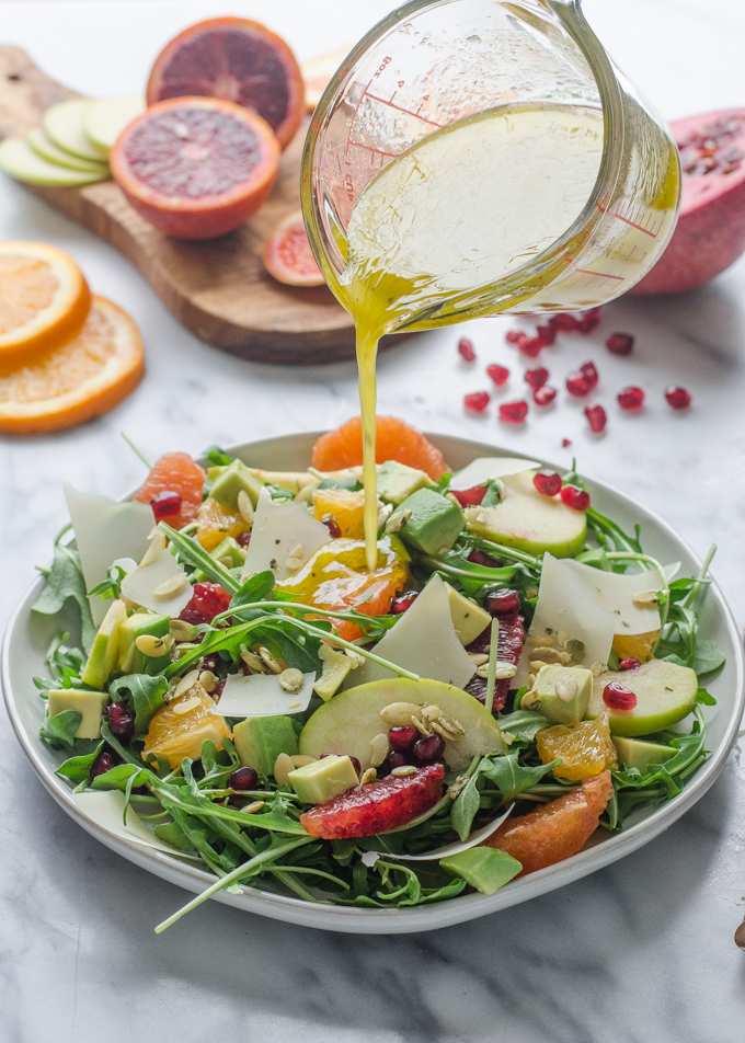 Winter Salad with Arugula, Avocado, Pomegranate, Blood Orange, and Apple