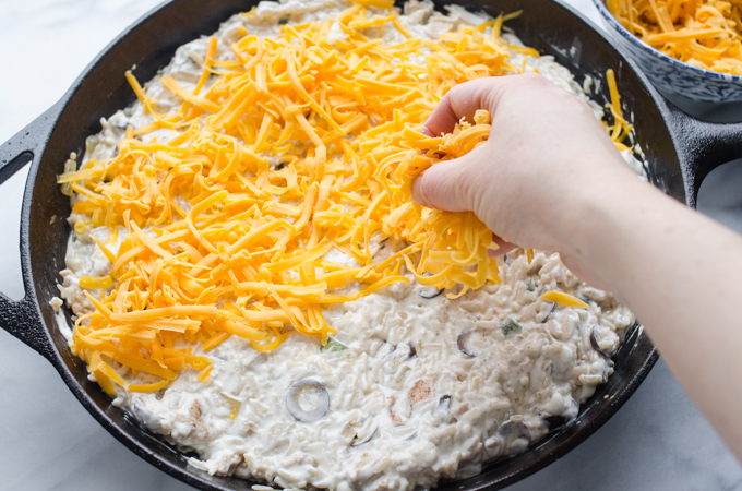 Photo of topping the skillet with cheese