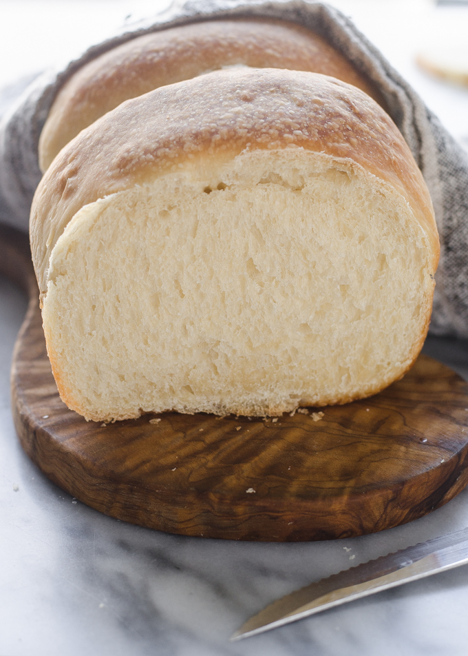 Sourdough Sandwich Bread with a slice taken out of it.