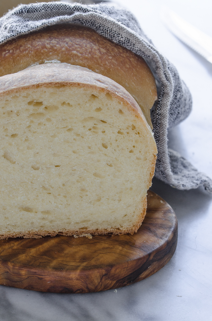 Close up shot of the crumb of this soft sourdough sandwich bread.