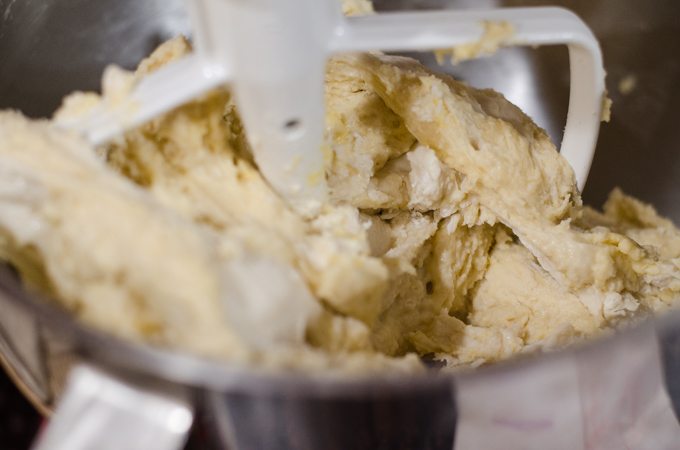 Mixing the dough with a paddle attachment. 