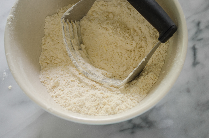 Cutting the butter into the dry ingredients