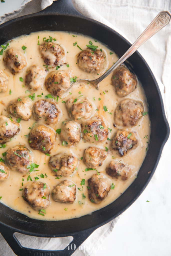 Swedish meatballs in a skillet from above.