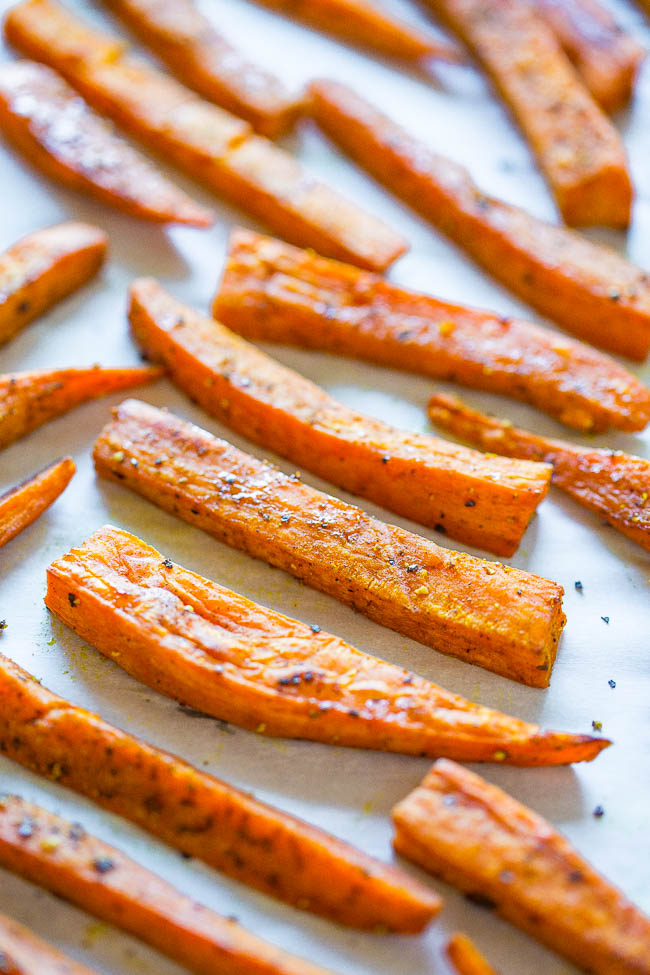 Roasted fries on a baking sheet.