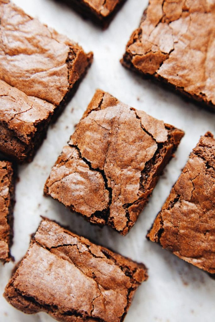 From above shot of slices of brownies with crinkly tops.