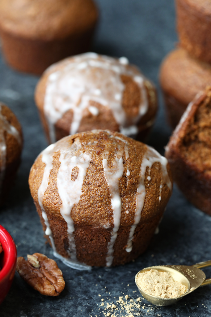 Gingerbread muffins drizzled with a glaze.