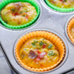 Baked egg muffin cups in the pan.