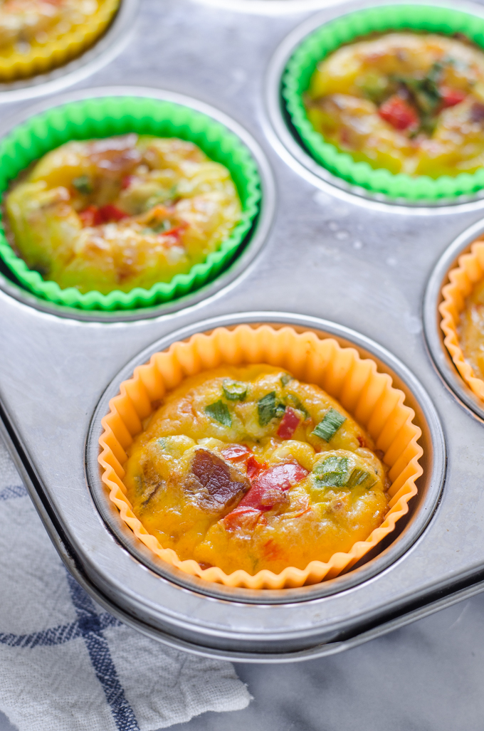 Baked egg muffin cups in the pan.