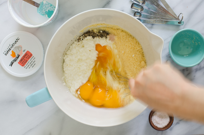 Whisking together the ingredients.