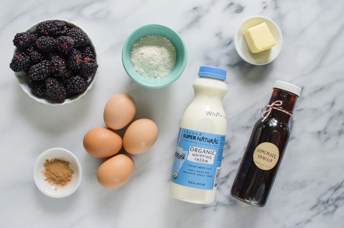 Ingredients for the low carb crepes set out on a marble surface.