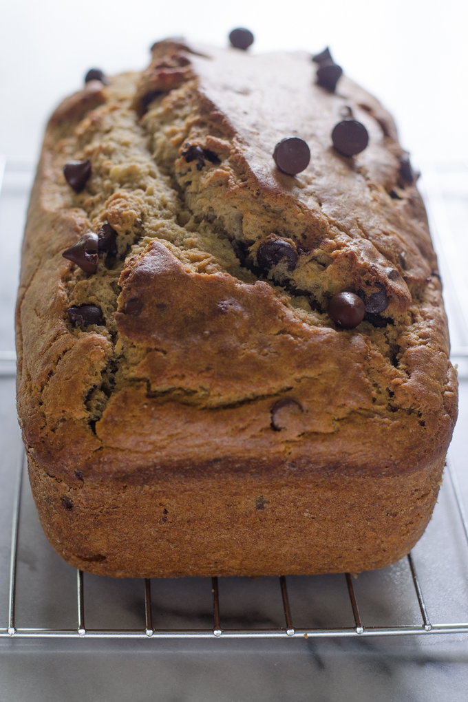 Sourdough banana bread on a cooling rack.