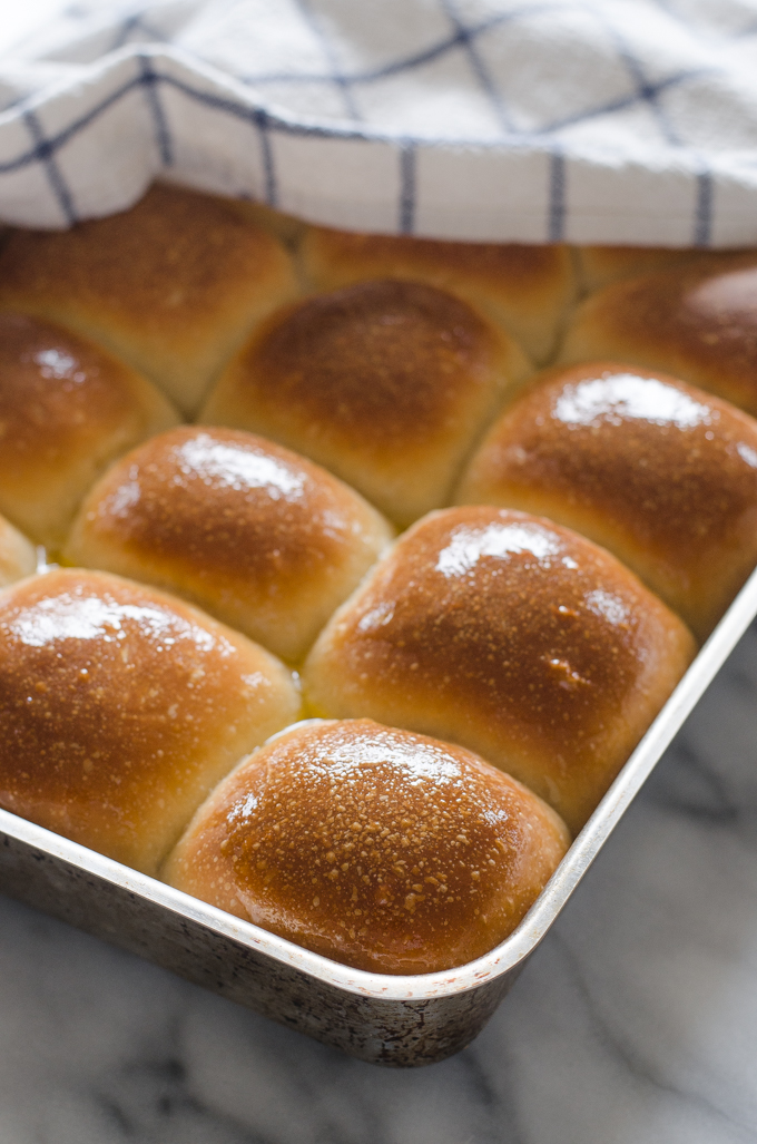 Sourdough Pull Apart Rolls with melted butter on top.