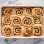 The baked rolls from above in a pan.