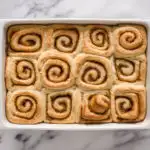 The baked rolls from above in a pan.