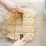 Cutting the dough into squares.