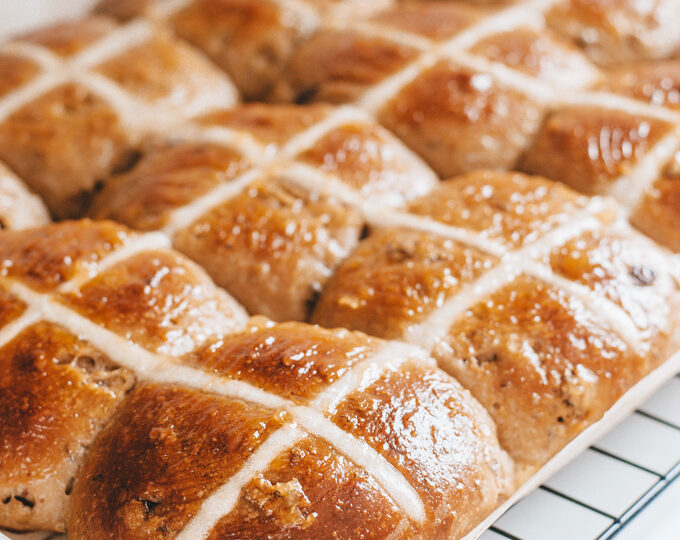 Sourdough hot cross buns with a flour paste cross.