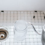 Sterilizing a wide mouth mason jar.