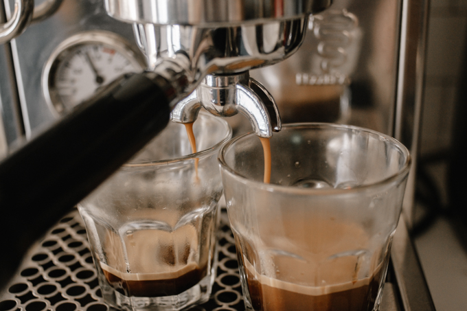 Pulling a shot of espresso with an espresso machine.