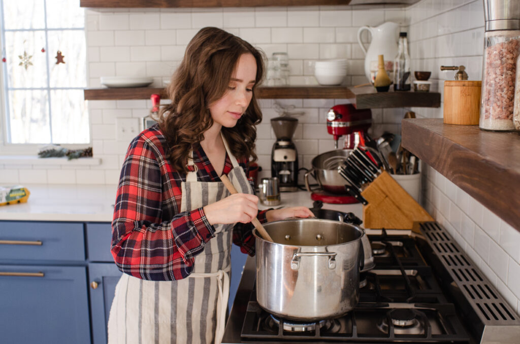 Stirring the eggnog custard over low heat.