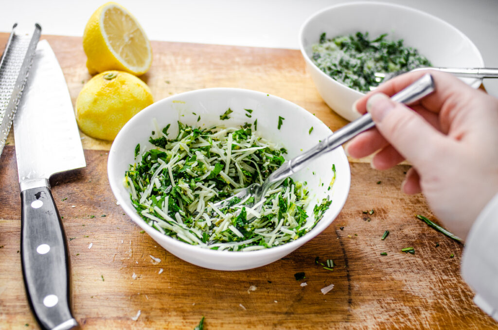 Mixing together the seasoning blend in a small bowl. 