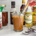 Whisking together the ingredients for the stir-fry sauce for a healthy chicken stir-fry.