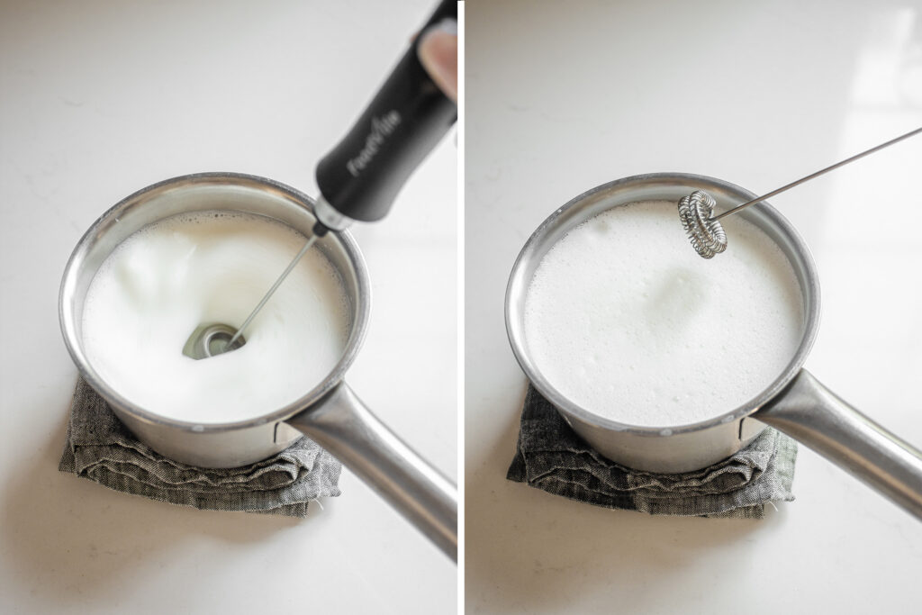 Frothing the milk in the pan with a hand held milk frother.