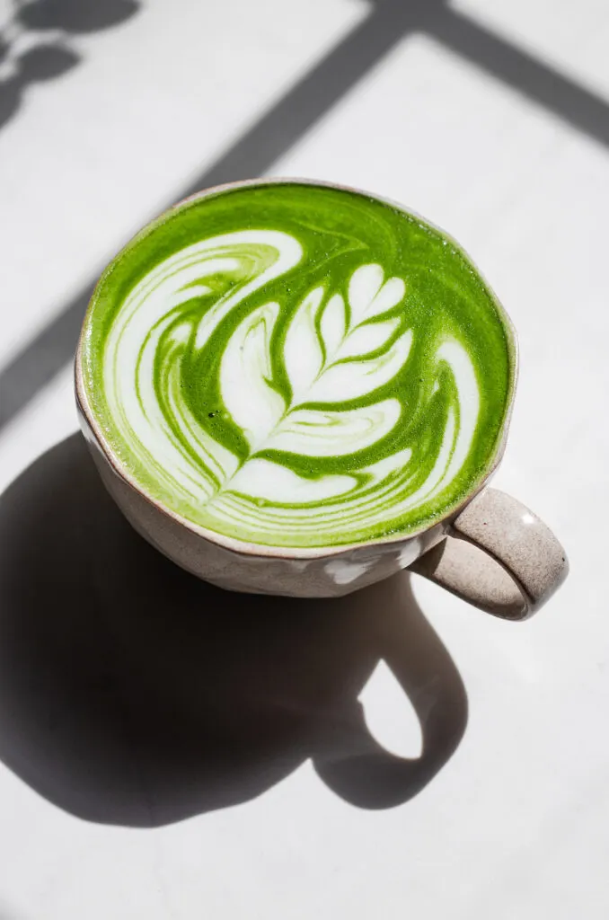 https://www.butteredsideupblog.com/wp-content/uploads/2022/07/Starbucks-Hot-Matcha-Green-Tea-Latte-Recipe-16-678x1024.jpg.webp