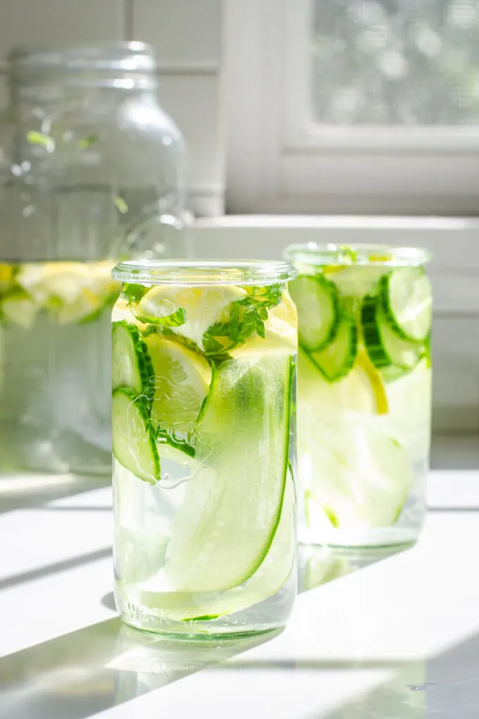 https://www.butteredsideupblog.com/wp-content/uploads/2022/09/cucumber-lemon-mint-water-recipe-34-scaled.jpg.webp
