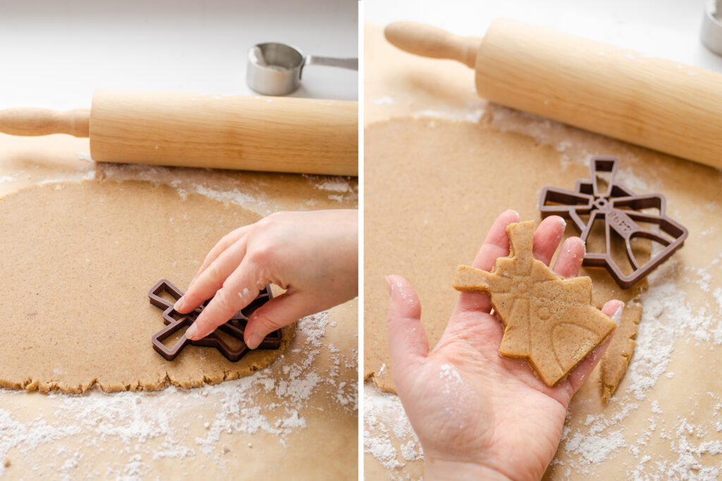 Cutting out windmill shaped cookies from the speculaas dough.