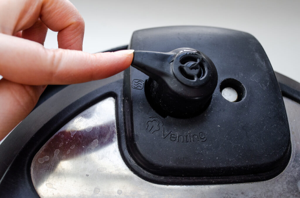 Setting the Instant Pot to sealing before cooking the soup.