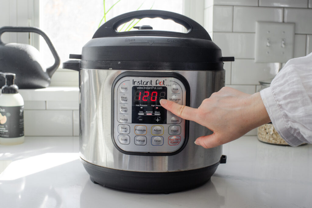 Setting the Instant Pot to the Soup function for 120 minutes on high pressure.