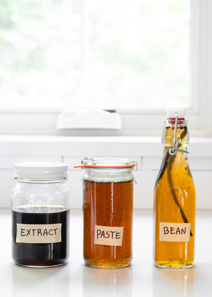 Different types of vanilla syrup for coffee in different bottles.