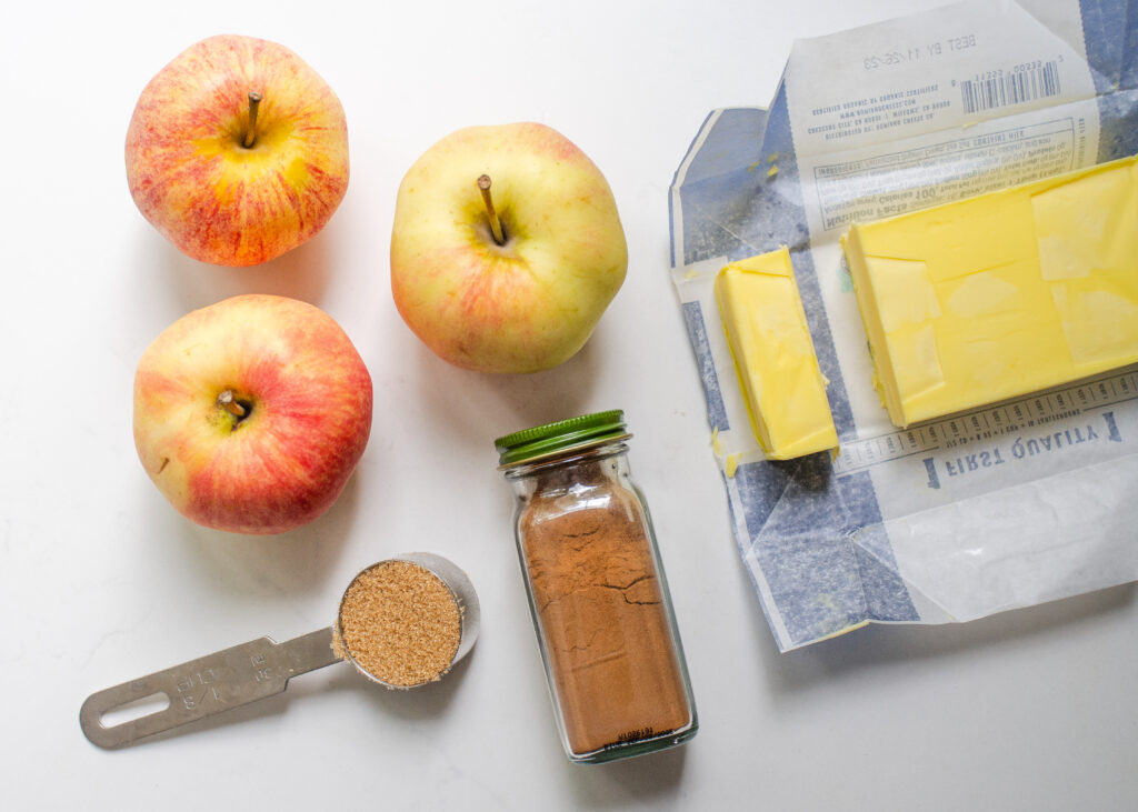 All of the ingredients needed to cook the apples.