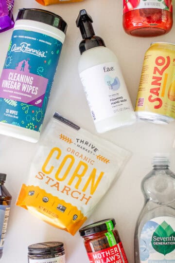 Some of the best Thrive Market products laid out on a white countertop.
