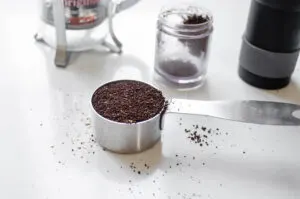 1/4 cup of coarsely ground coffee for making espresso with a French press.