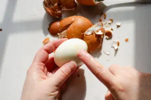 Pointing to the orange spot on the baked hard boiled egg.