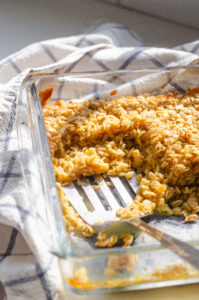 A pan of baked oatmeal with some taken out.
