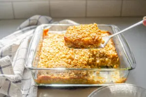 Dishing up a spatula-full of the baked oatmeal. 
