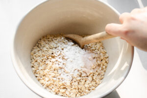 Mixing together the dry ingredients for baked oatmeal.